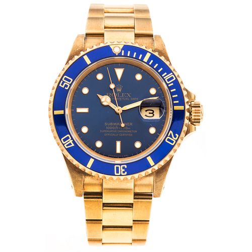 ROLEX OYSTER PERPETUAL DATE SUBMARINER. 18K YELLOW GOLD. REF. 16618, CA. 1990