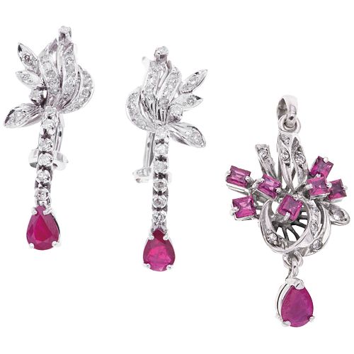 PENDANT AND PAIR OF EARRINGS WITH RUBIES AND DIAMONDS IN PALLADIUM SILVER with 10 rubies and 49 diamonds. Weight: 10.0 g