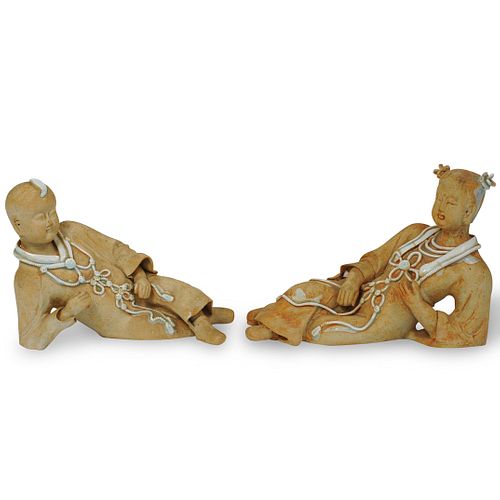 Pair of Chinese Reclining Figures