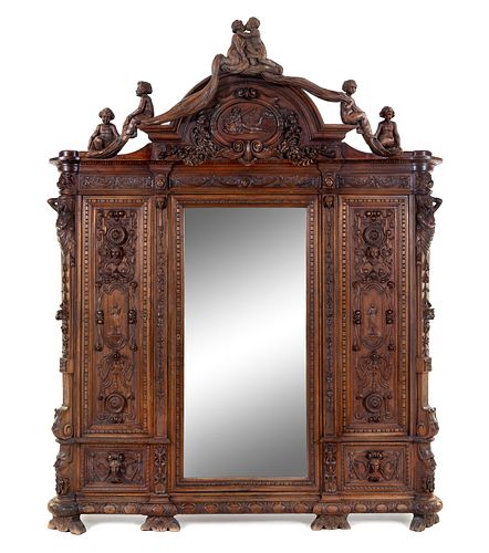 A French Renaissance Revival Carved Walnut Armoire