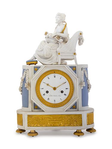 An Empire Style Gilt Metal Mounted Bisque Porcelain Mantel Clock