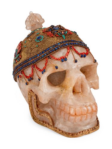 A Filigree, Lapis Lazuli, Coral and Turquoise Mounted Rock Crystal Skull