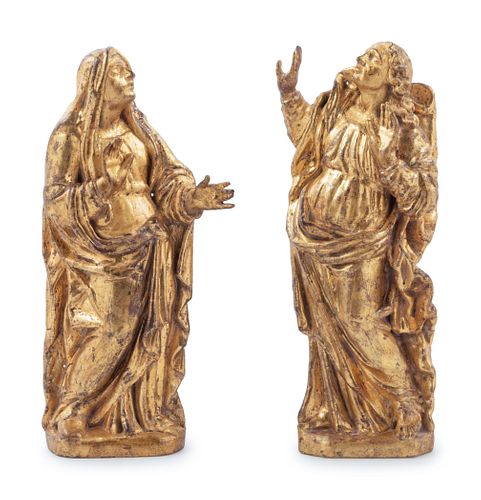 A Pair of Continental Giltwood Relief Carved Figures