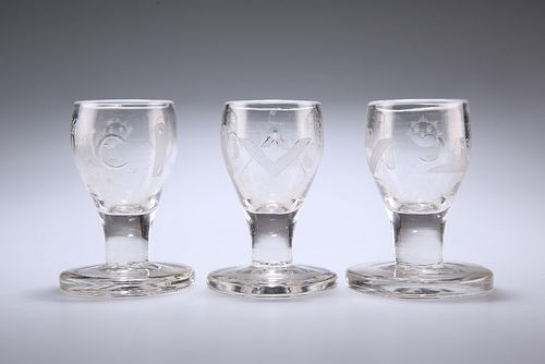 MASONIC INTEREST
 A SET OF THREE FIRING GLASSES, LATE 18TH CENTURY, slightl