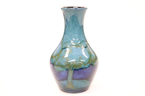 WILLIAM MOORCROFT
 A "MOONLIT BLUE" VASE, CIRCA 1925, of bottle form, decor