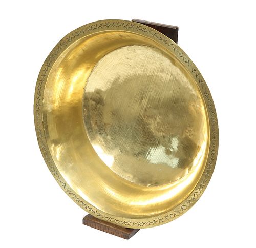 A 19TH CENTURY BRASS CREAM BOWL ON STAND, the rim decorated with concentric