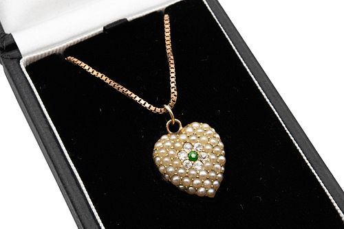 A LATE 19TH CENTURY SEED PEARL, GREEN GARNET AND DIAMOND PENDANT
 Of heart-
