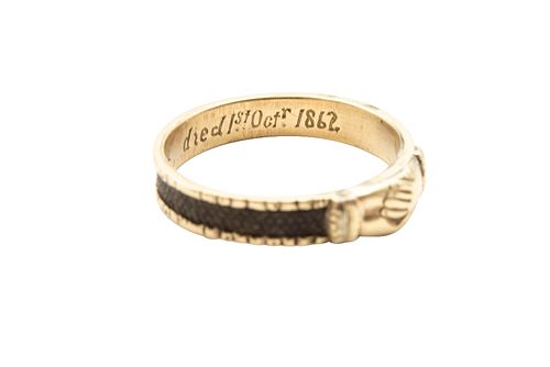 A HAIRWORK MOURNING RING, CIRCA 1862
 Designed as a pair of clasped hands, 