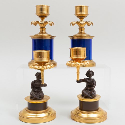 Pair of Chinoiserie Parcel-Gilt Candlesticks and a Pair of Blue Glass and Brass Candlesticks