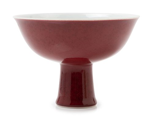 A Copper Red Glazed Porcelain Stem BowlHeight 4 1/4 x diam 5 7/8 in., 10.8 x 14.9 cm.