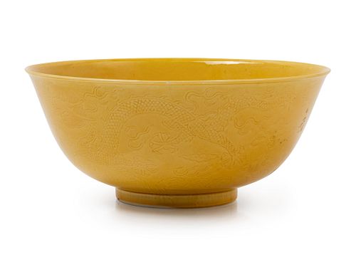 An Incised Yellow Glazed 'Dragon' Porcelain BowlDiam 7 1/4 in., 18.4 cm.