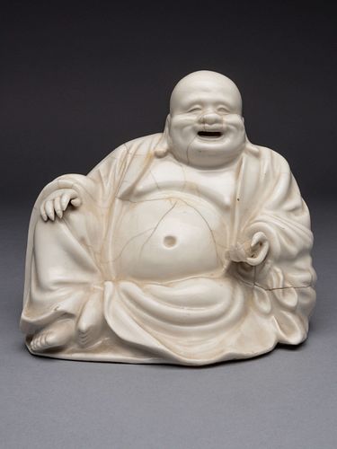 A Blanc-de-Chine Porcelain Figure of Budhai BuddhaHeight 6 in., 15.2 cm ...