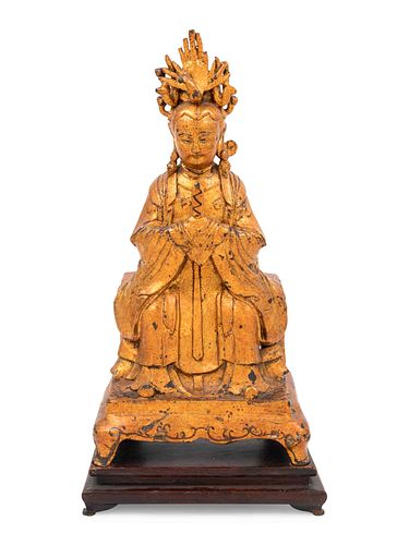 A Gilt Lacquered Bronze Figure of GuanyinHeight of figure 13 3/4 in., 34.9 cm.