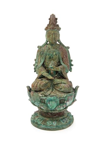 A Bronze Figure of Guanyin
Height 8 1/4 in., 21 cm.