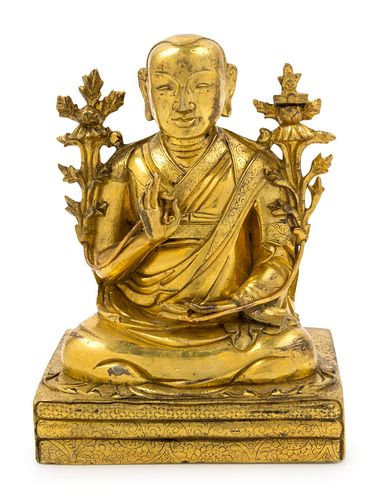 A Sino-Tibetan Gilt Bronze Figure  of Lama Tsongkhapa Height 6 1/8 in., 16 cm.
