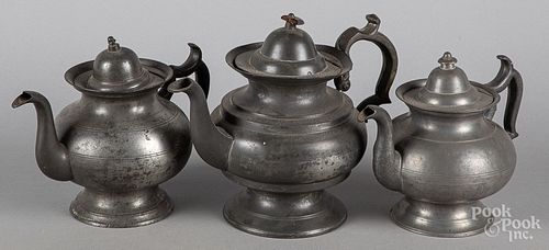 Three American pewter teapots, 19th c.