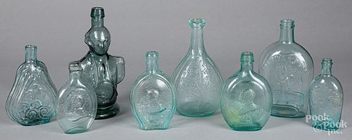 Historical aquamarine glass bottles and flasks