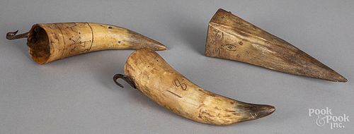 Three carved horn whetstone holders