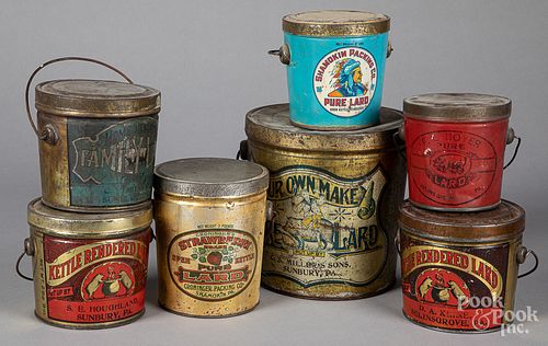 Seven lard advertising tins