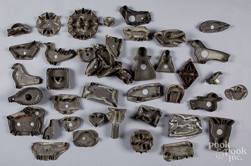 Collection of early tin cookie cutters