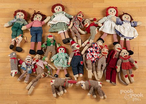 Group of Raggedy Anne/Andy dolls and sock monkeys
