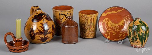 Seven pieces of Shooner redware