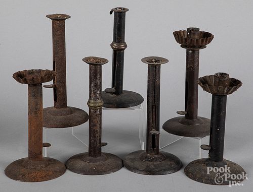 Seven hogscraper candlesticks, 19th c.