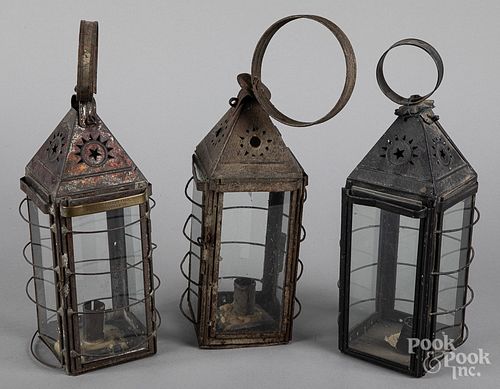 Three tin and glass carry lanterns, 19th c.