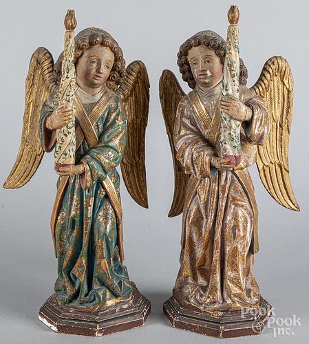 Pair of carved and painted Santos figures, 19th c