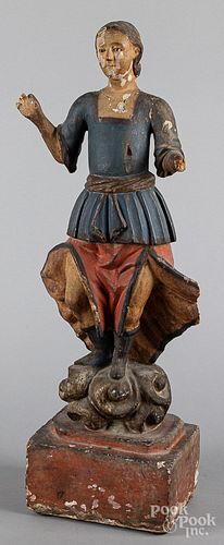Carved and painted Santos figure, 19th c.