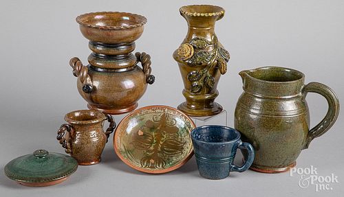 Six pieces of Stahl redware