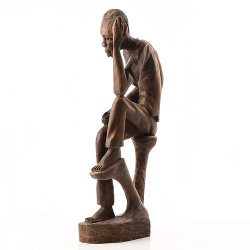 AFRICAN WOODEN FIGURE, MAN SITTING, HEAD RESTING ON HAND