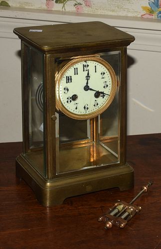 Brass and glass shelf clock, made in France