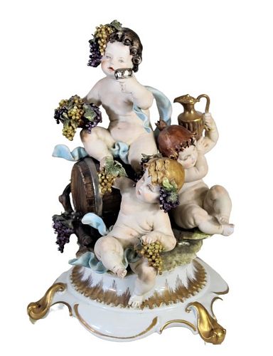 Bisque Porcelain Cherub Figural Group, Bacchus