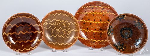 Four Stahl redware plates