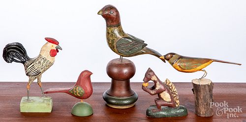 Five carved and painted animals