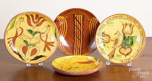 Four Breininger redware plates
