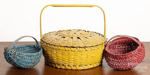 Three painted baskets