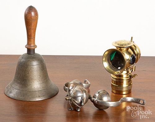 Brass bell, solar lamp, & bells.
