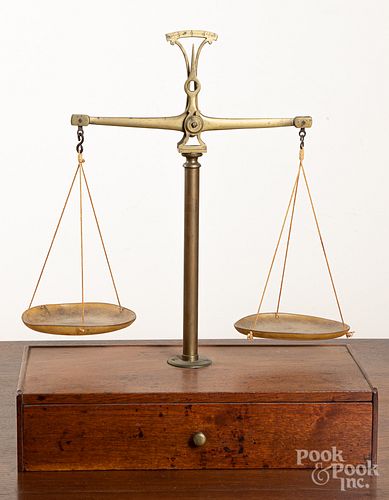 Brass balance scale with mahogany base