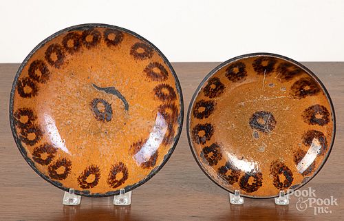 Two Pennsylvania redware plates