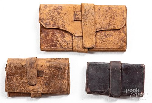 Three early leather pocketbooks