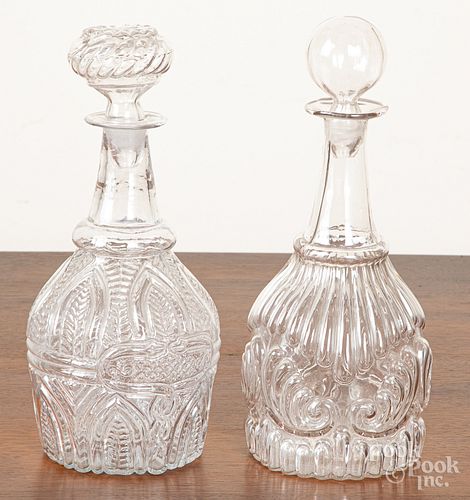 Two mold blown colorless glass decanters, 19th c.