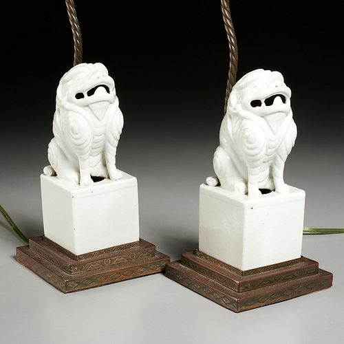 Pair Chinese porcelain foo lions mounted as lamps