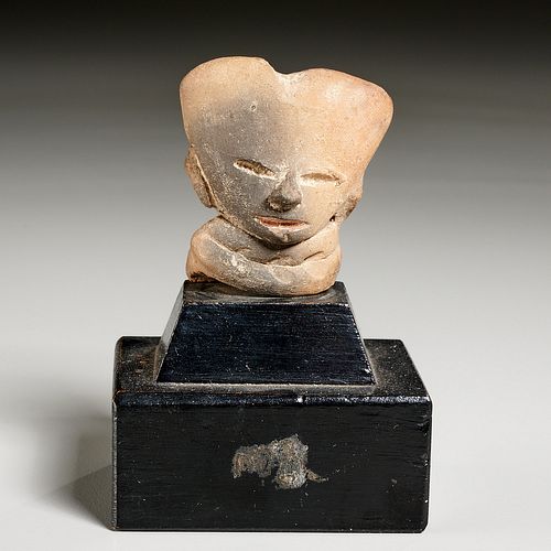 Pre-Columbian Totonac smiling face, ex-Komor