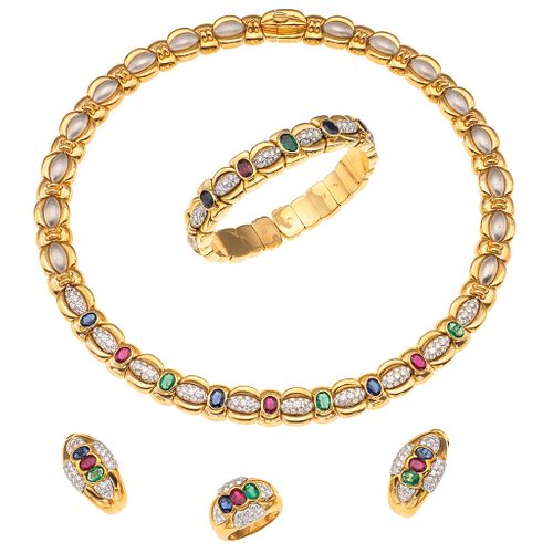 CHOKER, BRACELET, RING AND EARRINGS SET WITH EMERALDS, RUBYS, SAPPHIRES AND DIAMONDS. 18K YELLOW AND WHITE GOLD