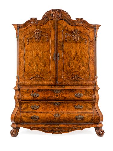 A Dutch Baroque Burlwood Cabinet Height 96 x width 74 x depth 27 inches.