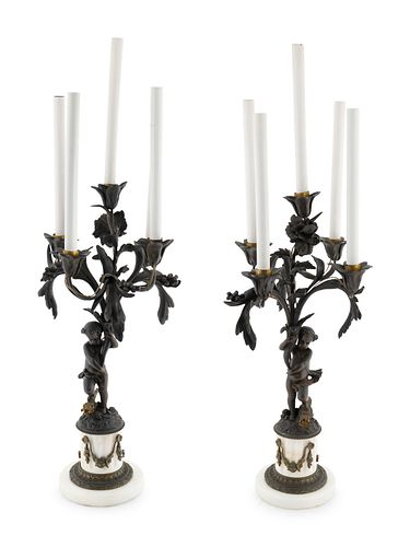 A Pair of French Bronze and Marble Five-Light Candelabra Height overall 32 inches.