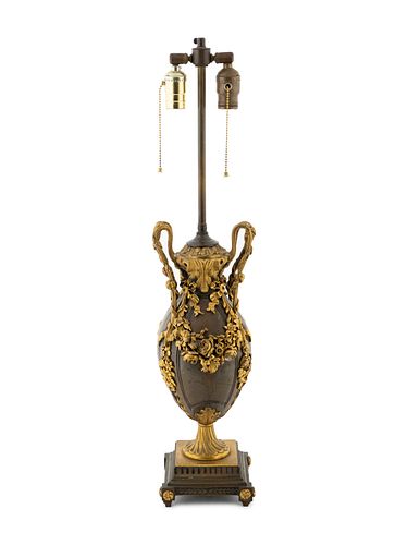A French Bronze and Gilt Metal Mounted Lamp Height 29 1/2 inches.