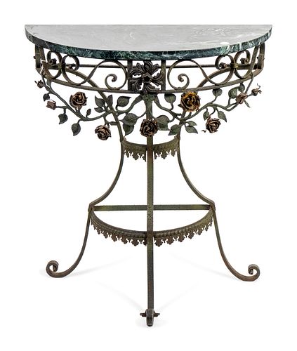 A Wrought Iron Marble Top Demilune Console Table Height 31 1/2 x width 29 1/2 x depth 12 inches.